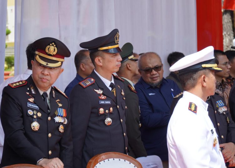 Kepala Rutan Kelas I Medan Andi Surya (tengah) saat menghadiri upacara dan syukuran HUT Bhayangkara ke-79  di Mapolda Sumatera Utara.(Satunusantara news/HO-Rutan Medan).