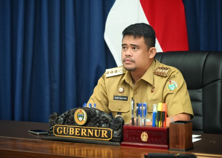 Gubernur Sumut Bobby Nasution, saat mengikuti Rakor Pengendalian Inflasi dengan Kemendagri secara virtual dari Rumah Dinas Gubernur Sumut.(Satunusantara news/HO-Diskominfo Sumut)