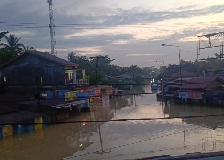 Banjir yang terjadi di  Pematang Tengah, Kecamatan Tanjung Pura, Kabupaten Langkat.(Satunusantara news/HO-Istimewa).