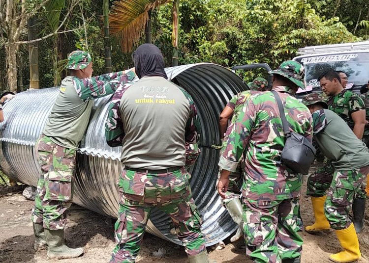 Satuan Yon Zipur 1/DD mulai pengerjaan dan pembangunan jembatan Aramco di Desa Janji Nauli, Kecamatan Purba Tua, Kabupaten Taput.(Satunusantara news/HO-Pendam I/BB)